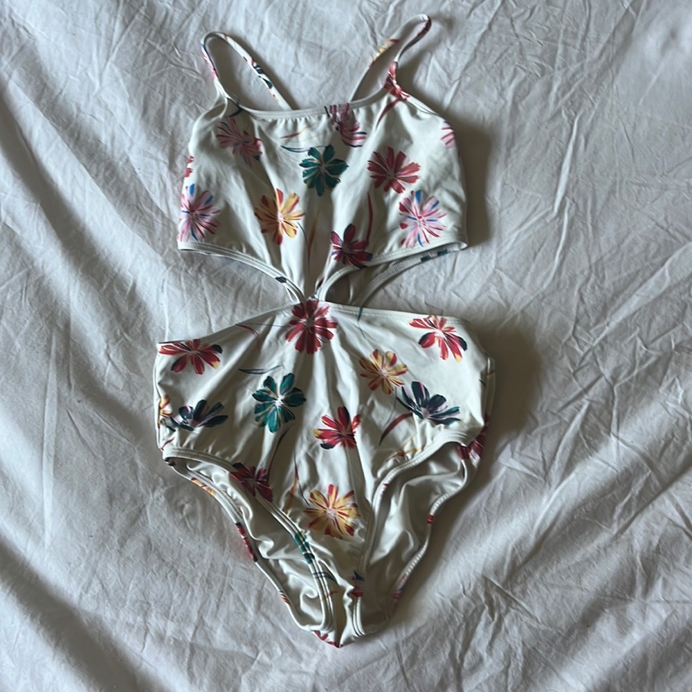 O’Neill one piece swimsuit with a cut out on both sides flowers